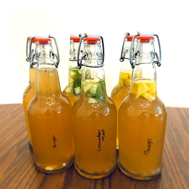 six bottles of homemade kombucha