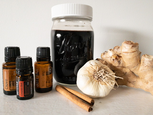 Essential oils, cinnamon, ginger, garlic, and elderberry syrup