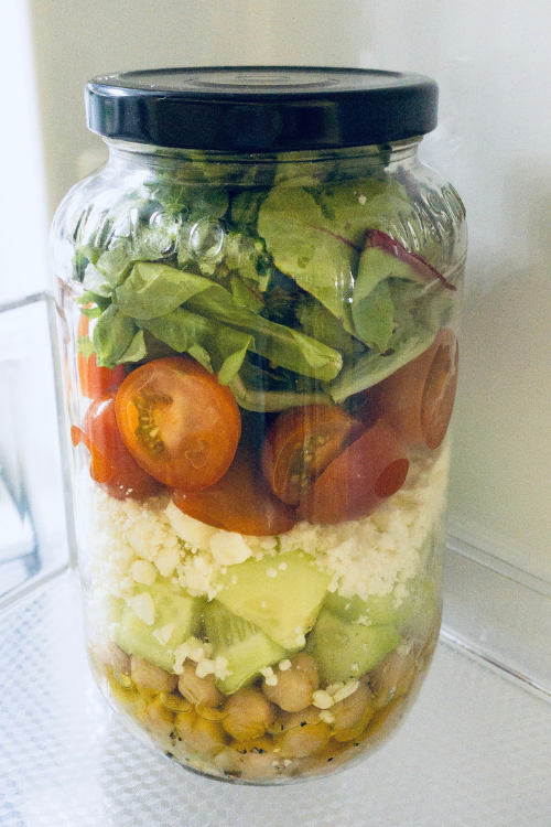 salad in a mason jar in the refrigerator