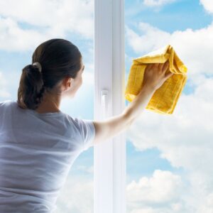 woman cleaning windows