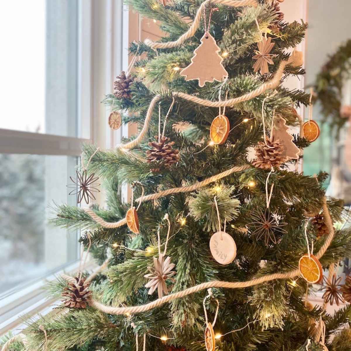 christmas tree decorated with all natural handmade christmas ornaments.