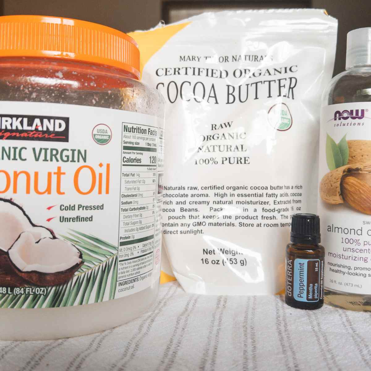 cocoa butter lotion recipe ingredients. coconut oil, cocoa butter, sweet almond oil, essential oil.
