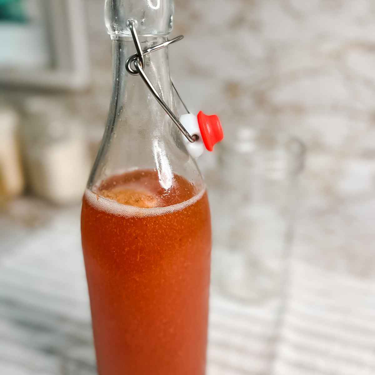 homemade kombucha in a swing top bottle