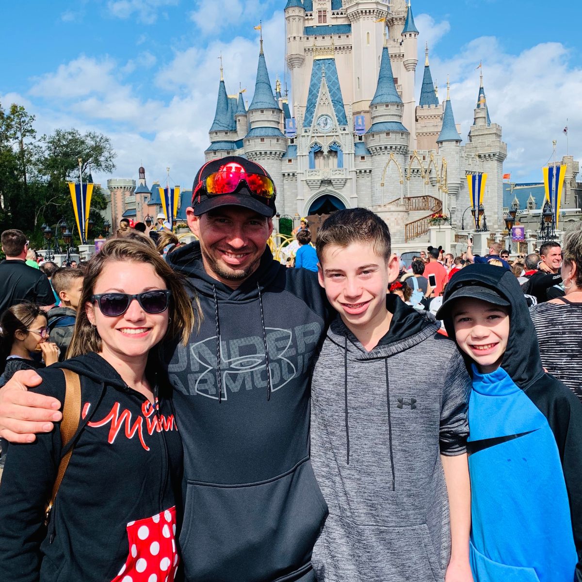 family of four at disney world
