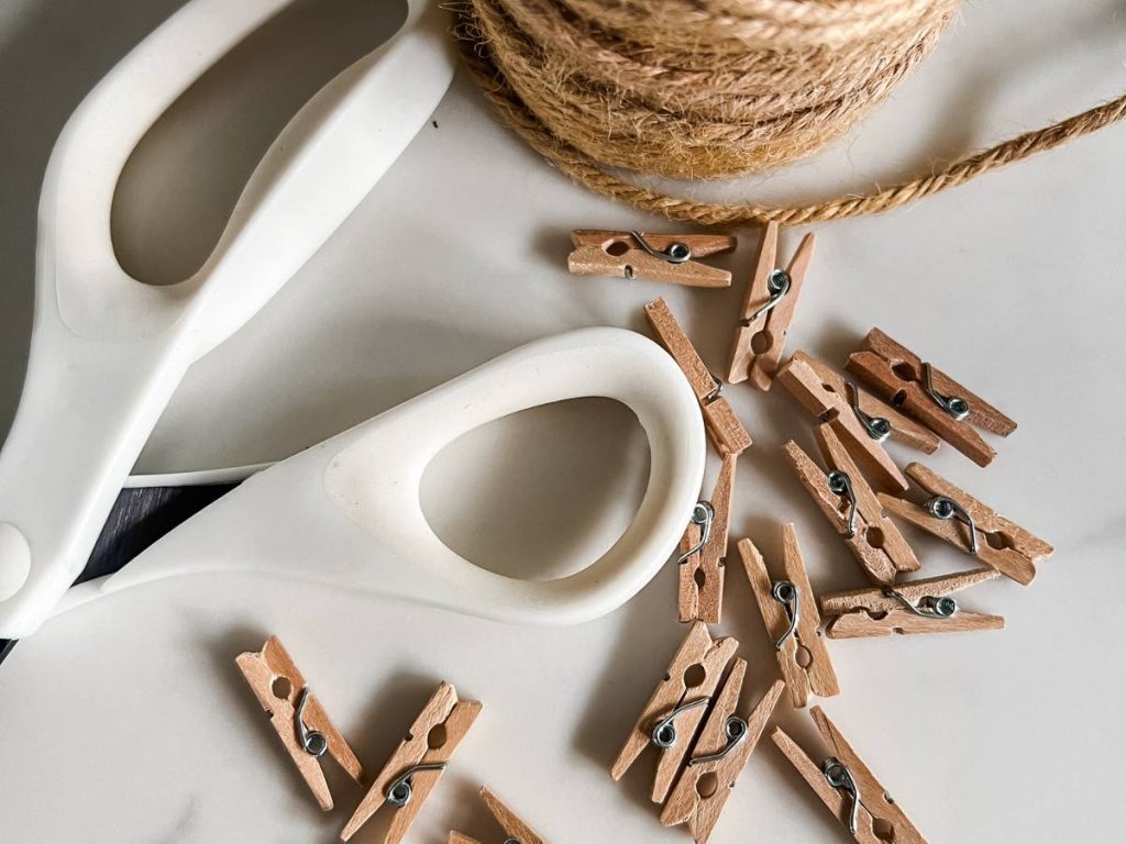 scissors, twine, and mini wooden clothespins